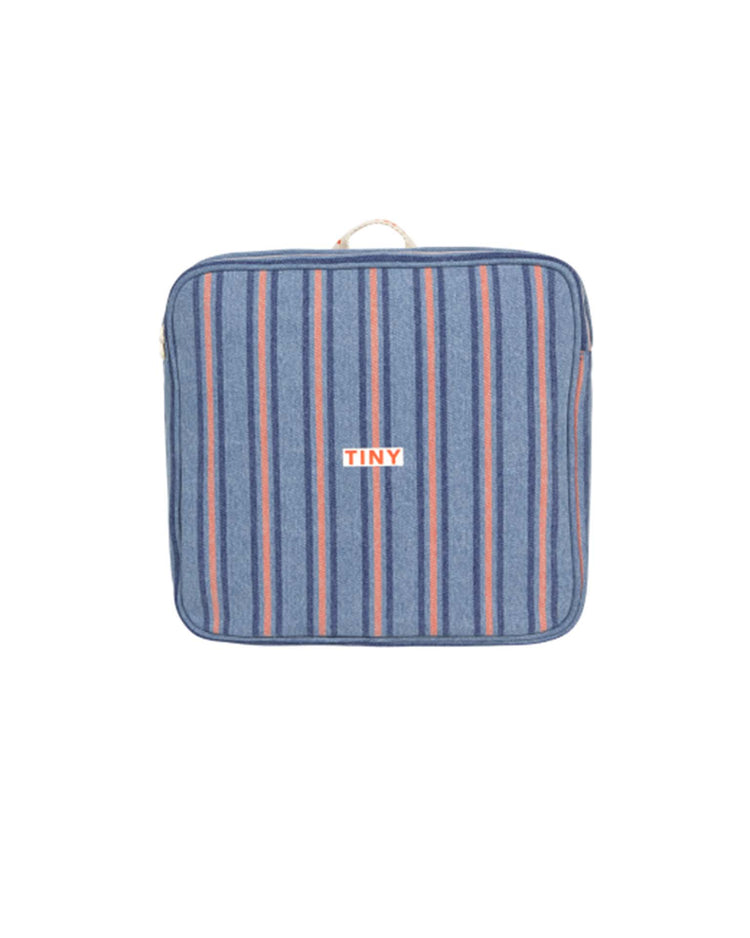 The stripes denim toddler backpack by tiny cottons features unique prints with vertical blue, red, and pink stripes. It has a small top handle and displays "TINY" in orange on the front, reflecting tiny cottons' high-quality clothing aesthetic.