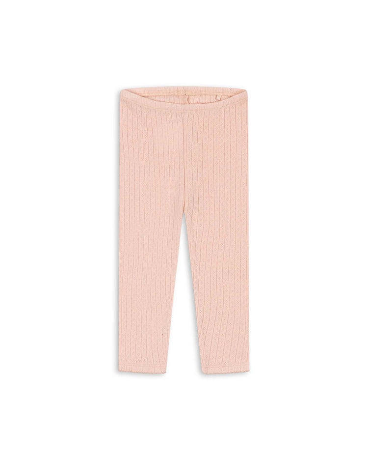 Minnie pants in pale blush by konges sløjd—soft, ribbed baby leggings crafted from organic cotton, displayed against a white background, making them a perfect everyday essential.
