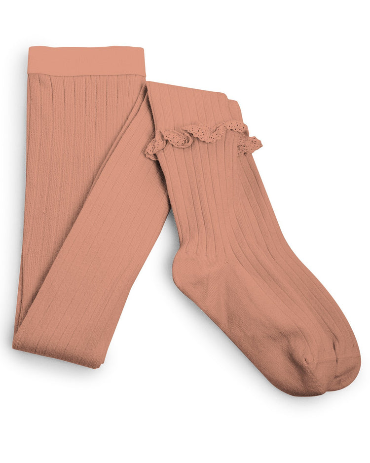 A pair of chloé tights in bois de rose made from Egyptian cotton with ruffle trim on a white background by collegien.