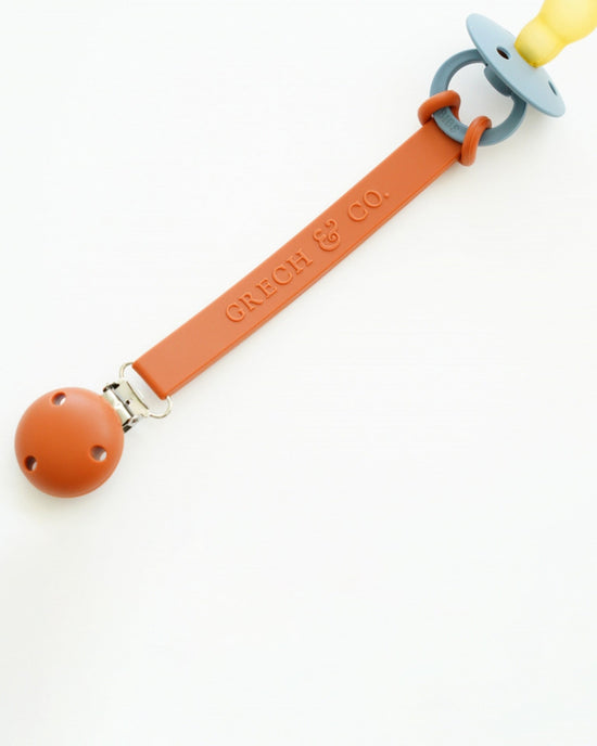 Little grech + co baby accessories pacifier clip in rust