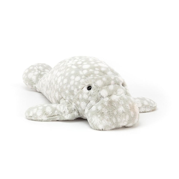 A gray and white Jellycat billow manatee stuffed animal with polka dots.