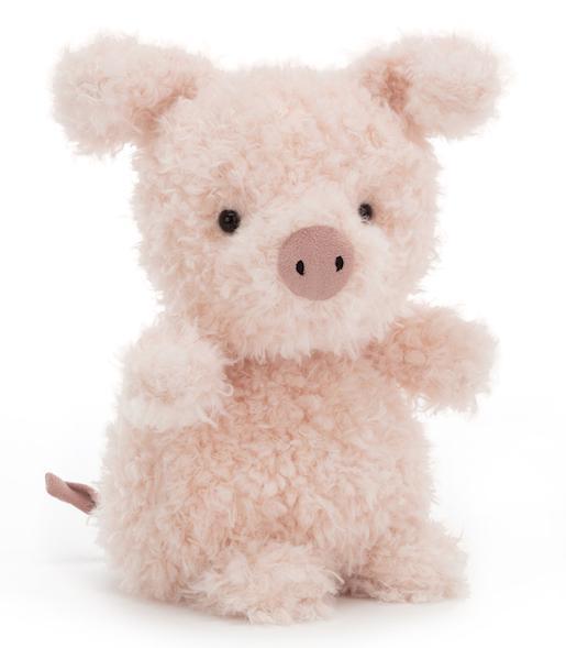 A fuzzy fur pink Jellycat Little Pig stuffed toy sitting on a white background.