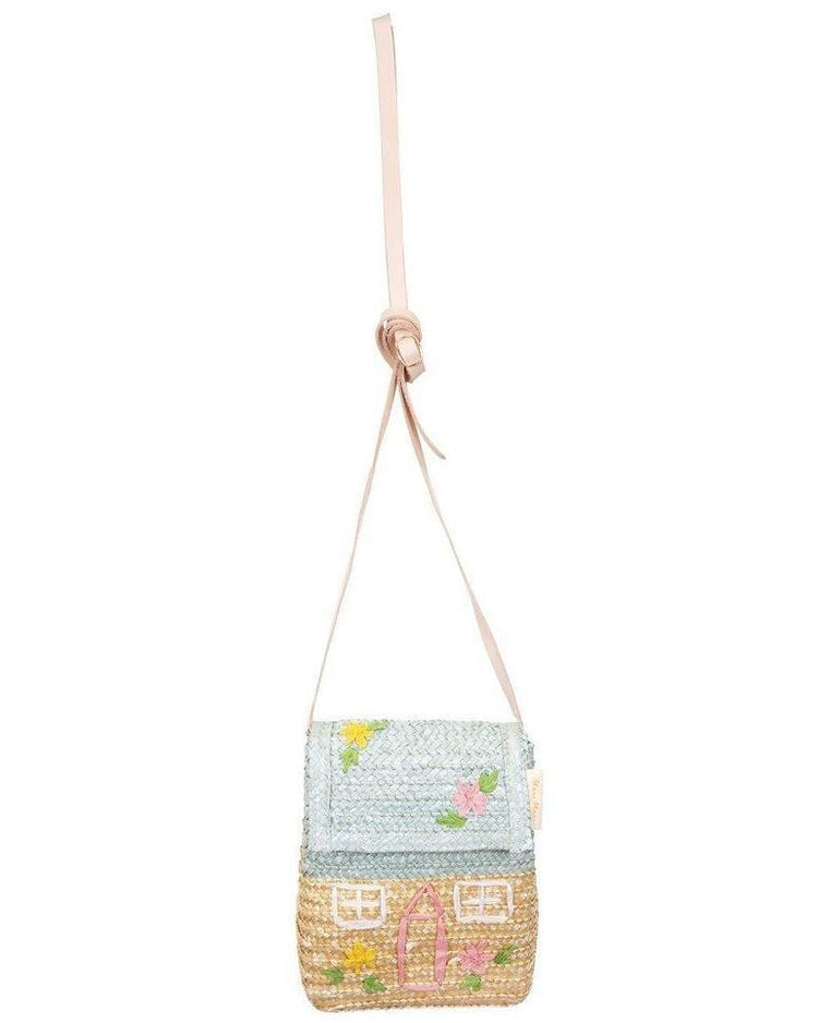 Crossbody bag designed to resemble a quaint cottage with a floral motif and a pink woven straw strap by meri meri.