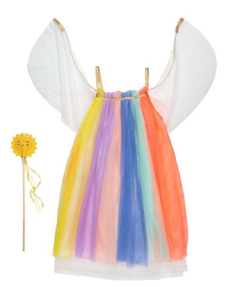 A colorful meri meri rainbow dress up costume with rainbow tulle and wing-like sleeves, displayed next to a flower-shaped wand.