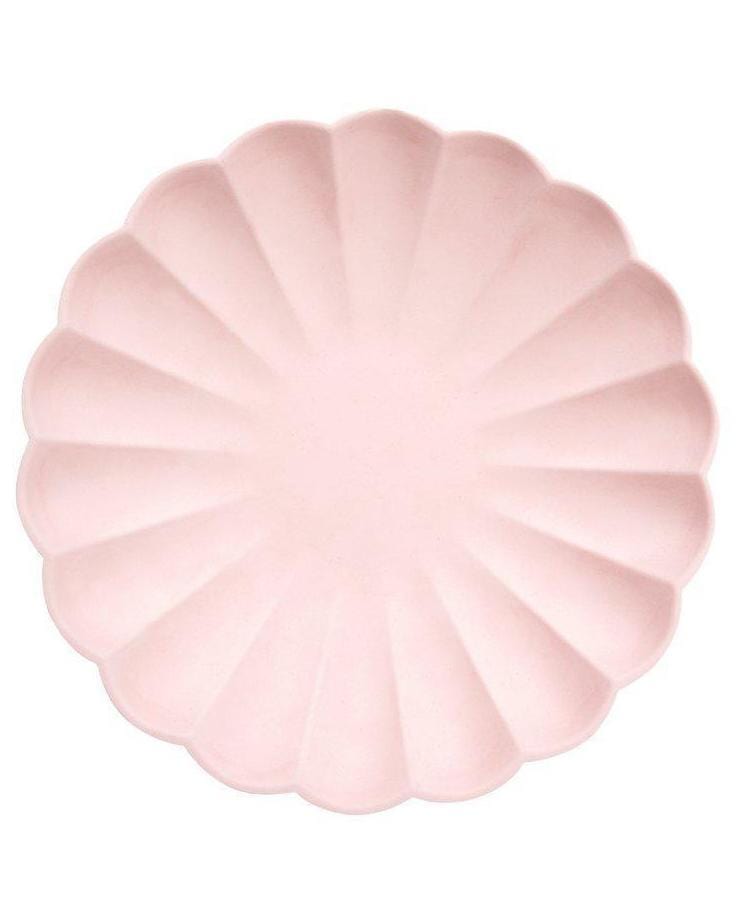 Meri Meri's simply eco large plates in pink with scallop edges on a white background.