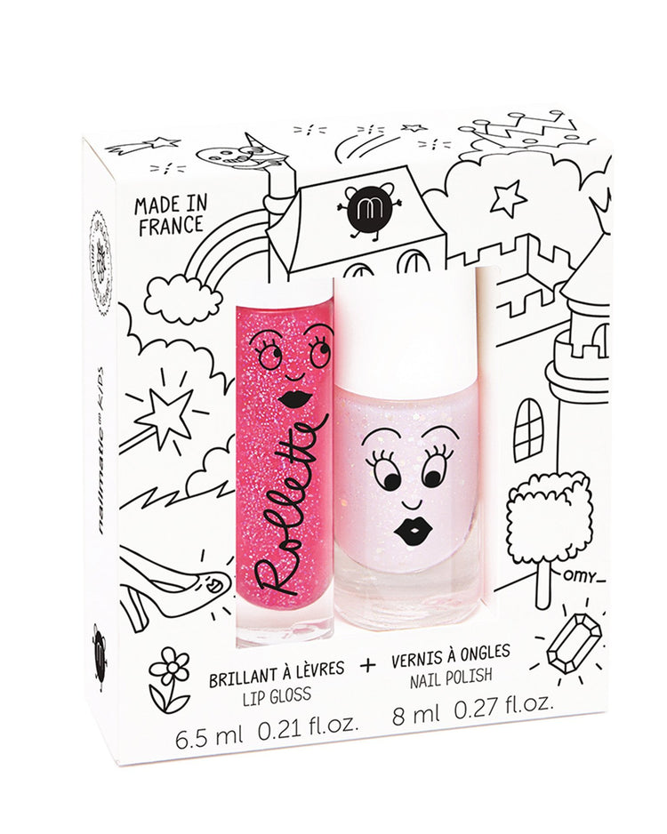 A nailmatic packaged set of fairytale organic lip gloss and nail polish with decorative cartoonish designs.