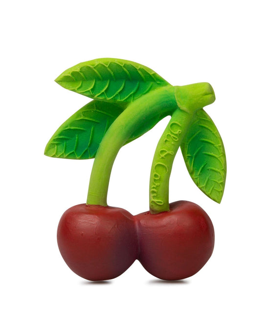 oli + carol's mery the cherry plastic baby toy in the shape of two cherries with leaves, isolated on a white background.
