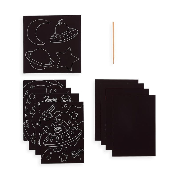 A set of black chalkboards with stars, planets, and astronauts on them from the ooly scratch & scribble art kit: space explorers - 10 piece set.
