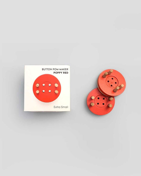 button pom maker in poppy red