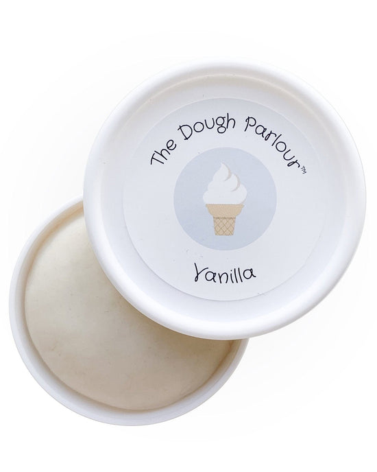 An open container of the The Dough Parlour vanilla modeling dough.